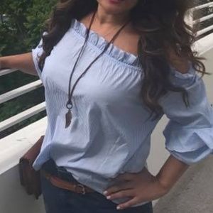 Blue and white striped blouse off the shoulders